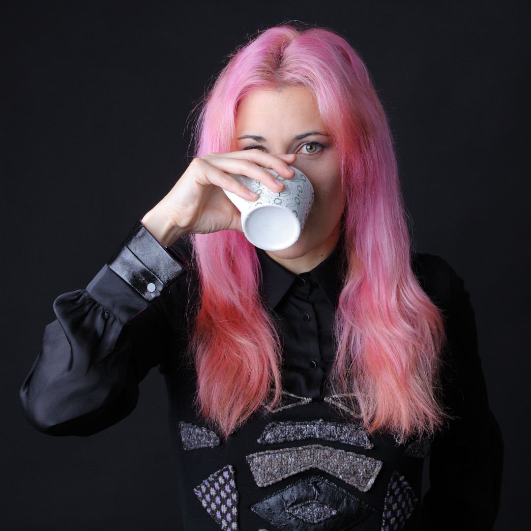 A photo of Mireia Vendrell drinking from a cup