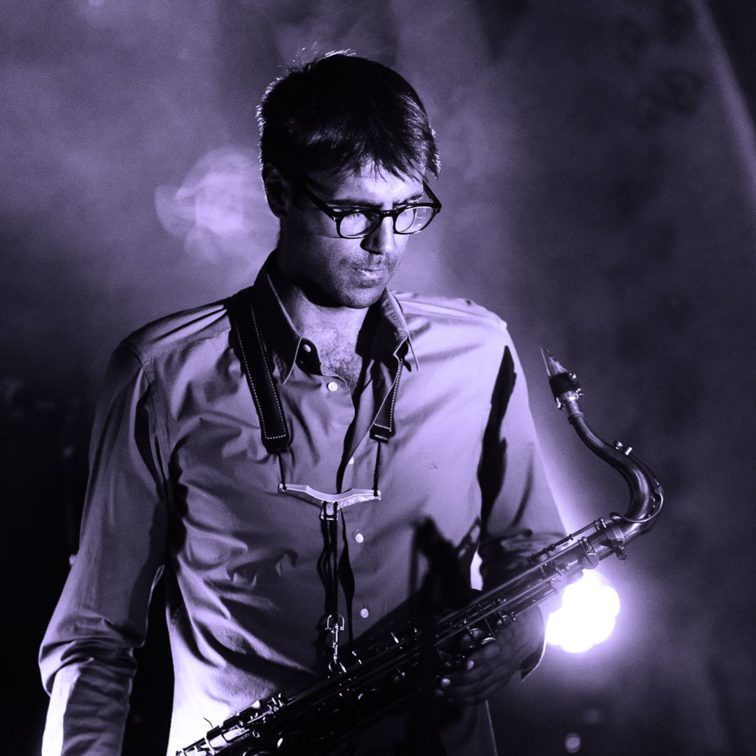 A photo of Predrag Okiljević holding a saxophone